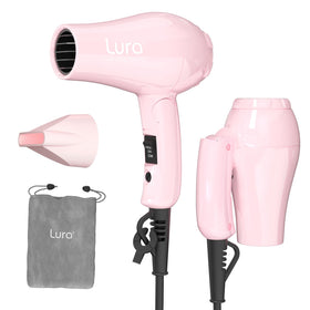 LURA foldable front view showing compact light pink body and controls for travel convenience