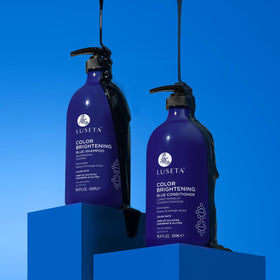 Luseta application on wet hair showing blue shampoo working to neutralize brassiness benefit