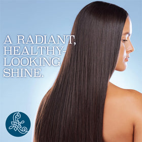 Luseta applied to hair ends illustrating smoother tips and reduced frizz benefit
