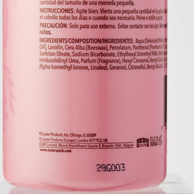 Luster's pink oil moisturizer used during styling showing frizz control benefit