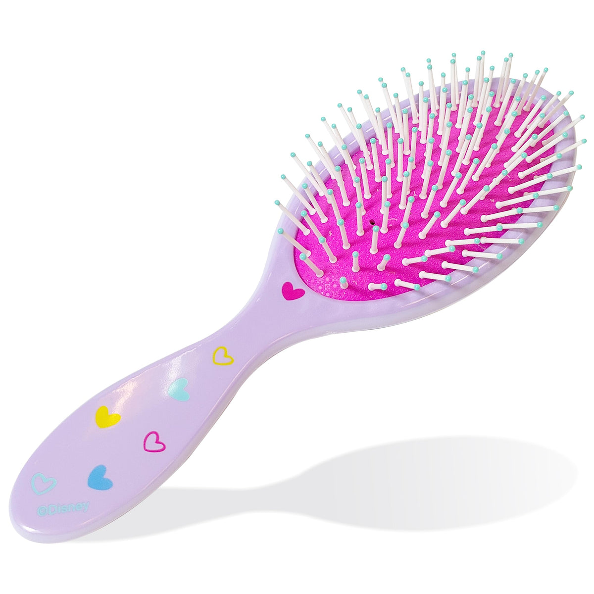 LUV HER brush in hand showing size and ergonomic benefit for kids