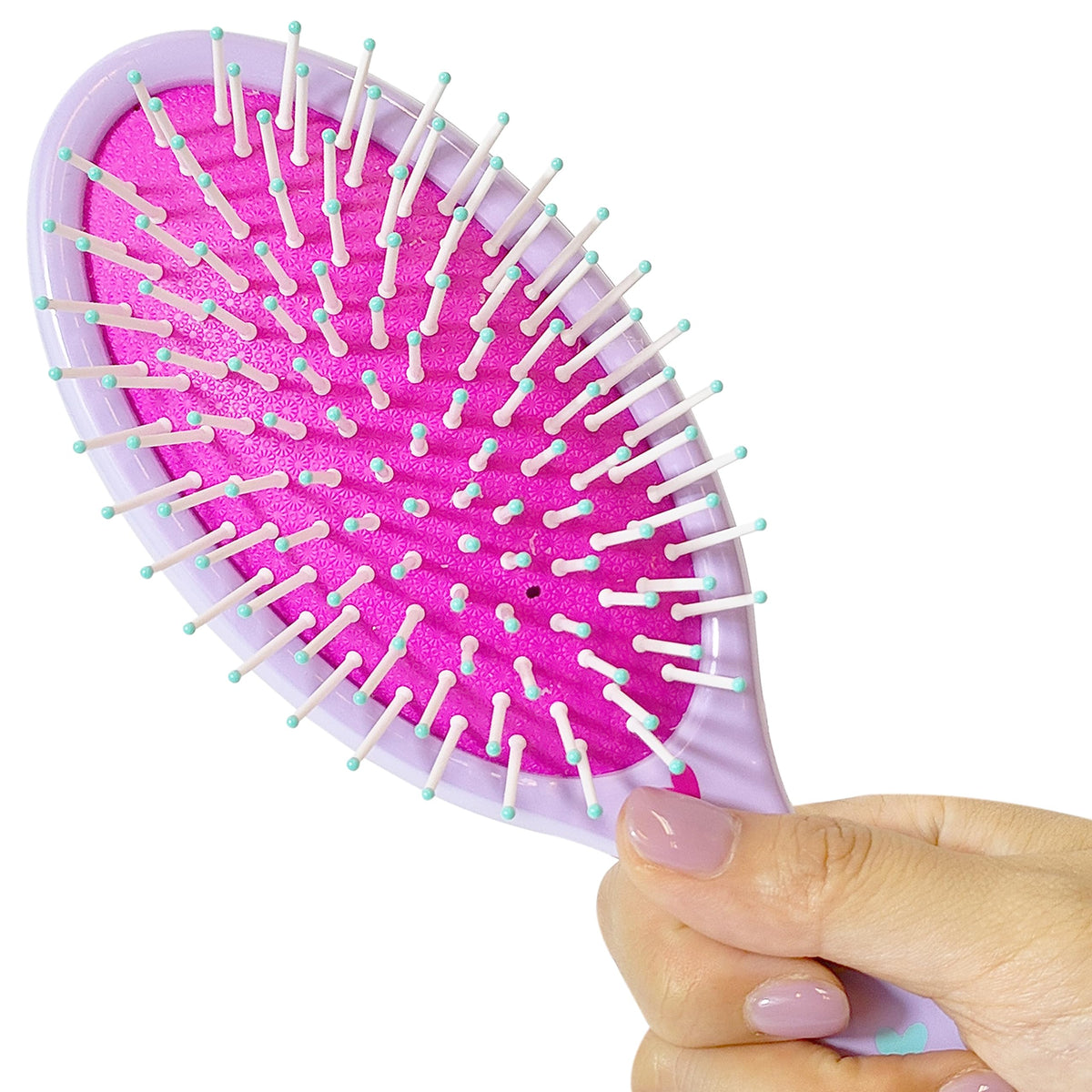 LUV HER hairbrush in kids hair demonstrating detangling with minimal pull