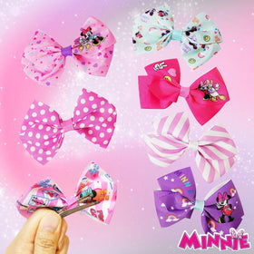 LUV HER bow beside ruler showing 4-inch size for accurate scale