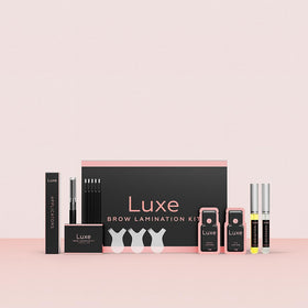 LUXE model application image showing silicone pad placement and glue use for safe results benefit