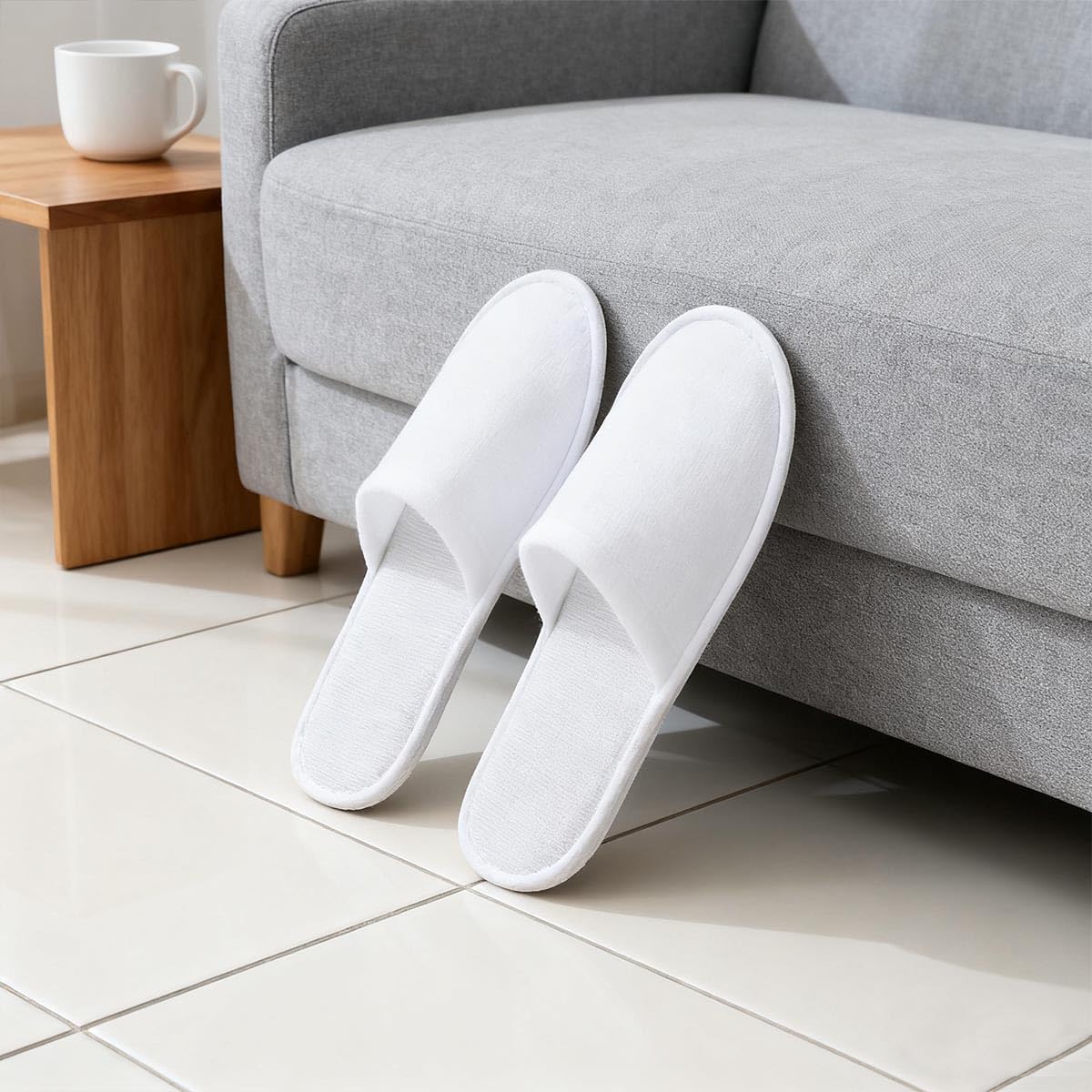 LYARCHTE slippers placed by bedside portraying guest-ready convenience and neat presentation benefit