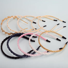 LYroo headbands held in hand showing slim design and portable scale