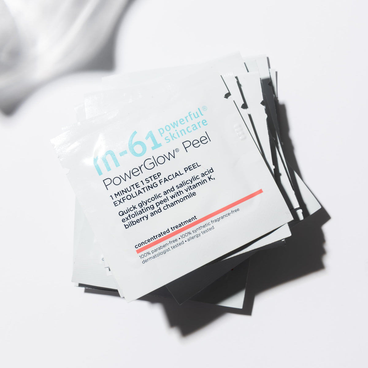 m-61 pad saturated with solution highlighting active acid formulation