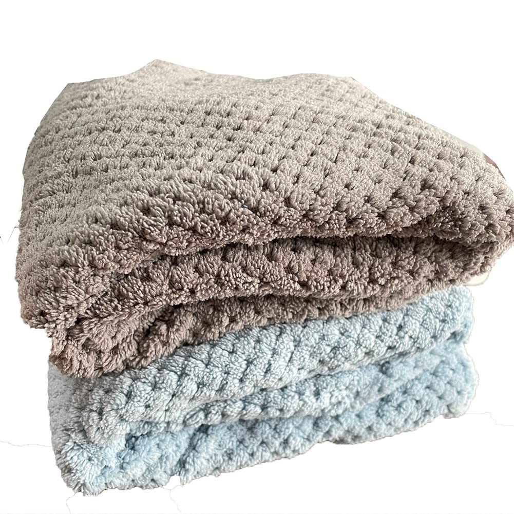 M-bestl two folded towels ready to wash highlighting easy care