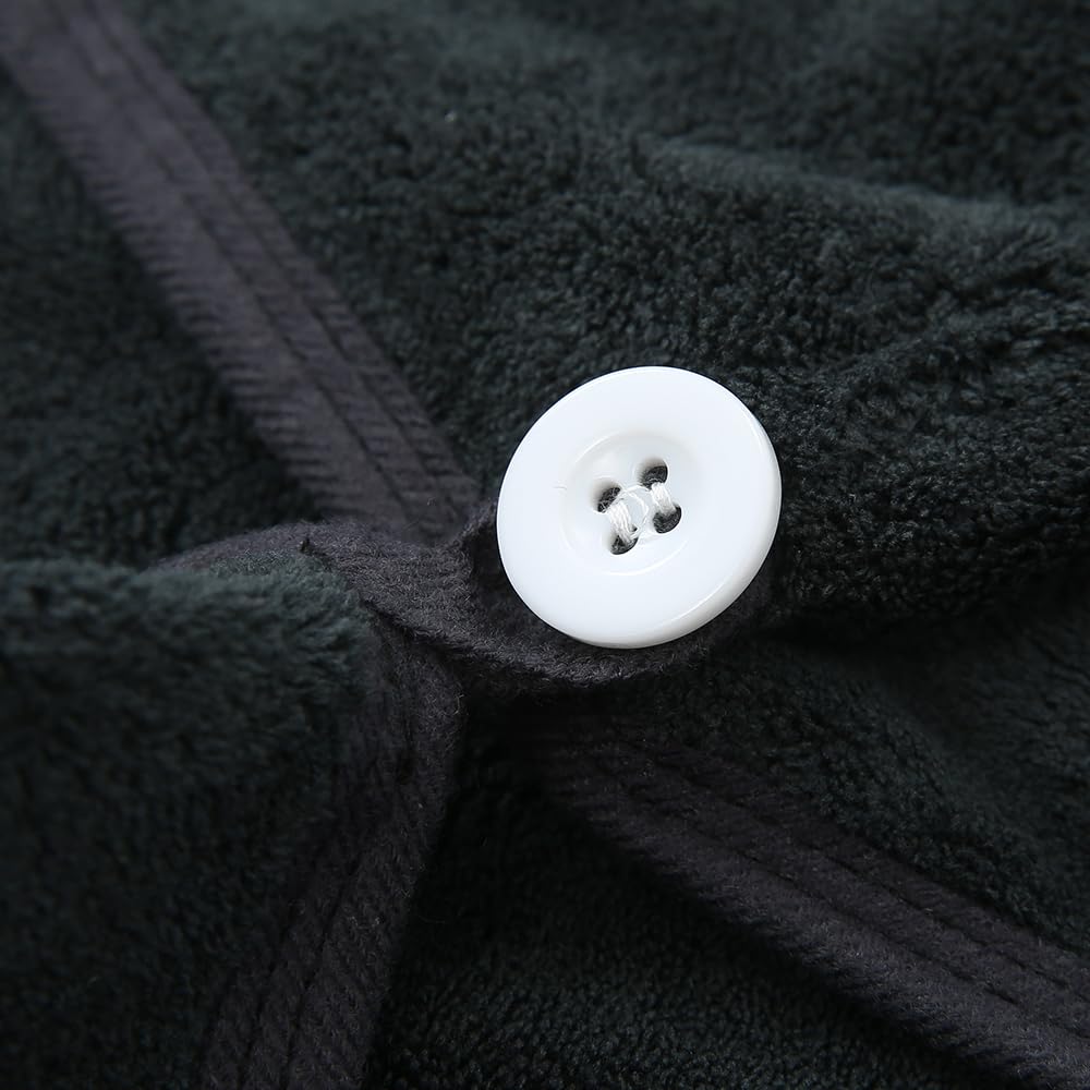M-bestl towel next to hand to show 25x65 cm size and fit for most head sizes