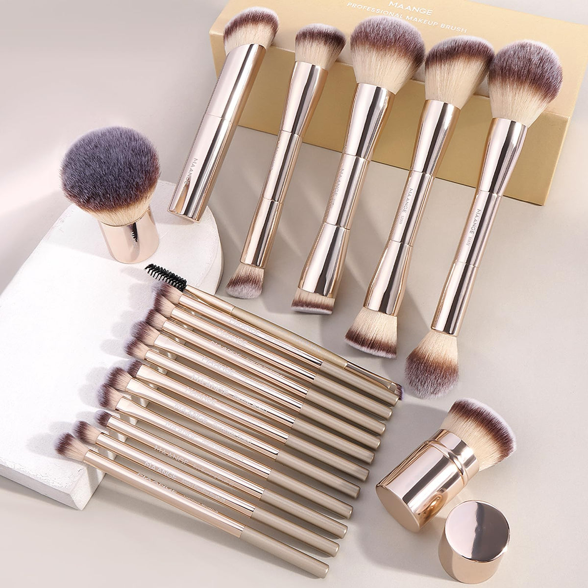 MAANGE brush handle beside ruler showing size and travel-ready portability