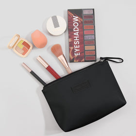 MAANGE open top view revealing roomy interior and two inner pockets for organization