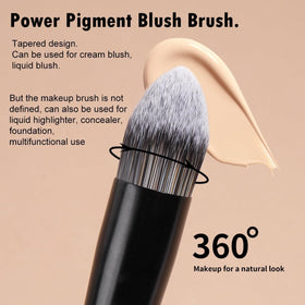 MAANGE brush held in hand for scale and easy travel-friendly size