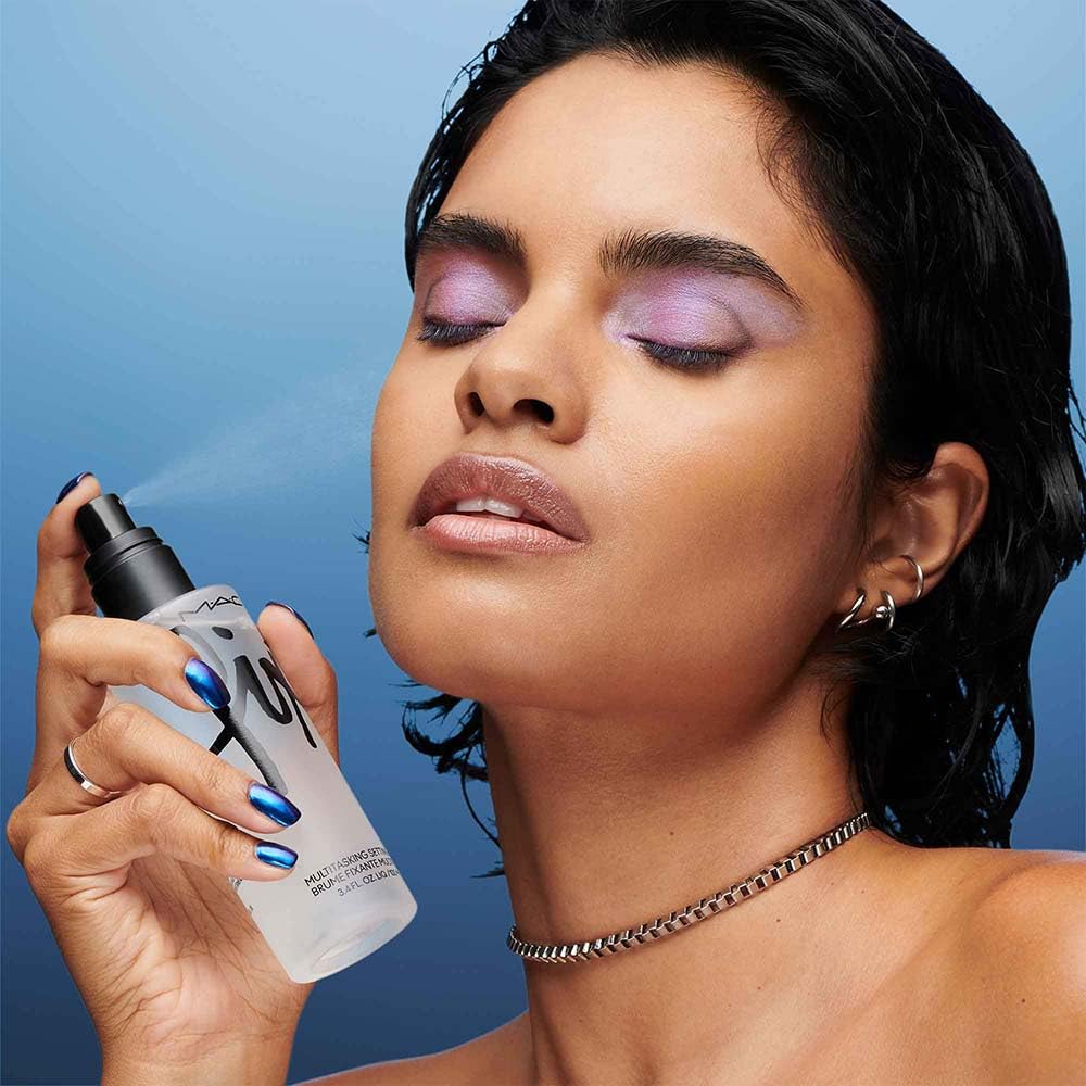 MAC Fixt Original used by makeup artist to blend and set cosmetics benefit
