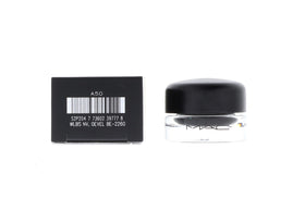 M·A·C brush stroke of Fluidline on skin demonstrating pigmented black payoff for precise lines