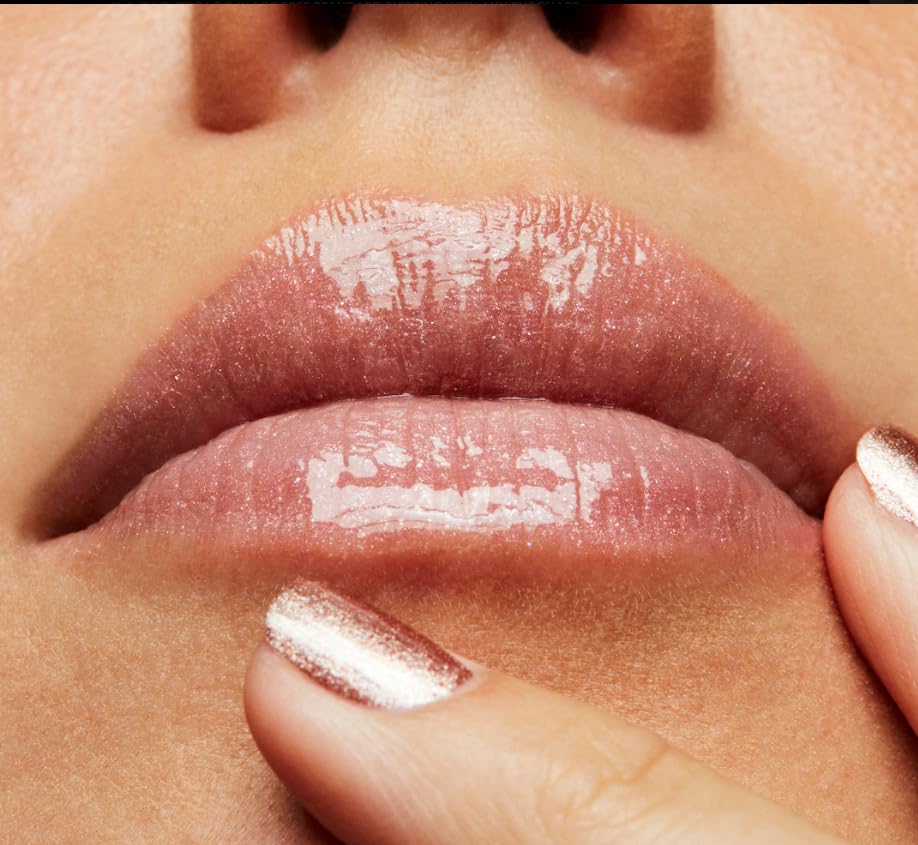 MAC Lipglass 321 Dreamy swatch on hand highlighting glittered pink colour payoff