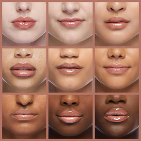 Model wearing MAC Lipglass Oh Baby showing glossy, conditioned lips benefit