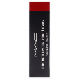 MAC Ruby Woo beside compact mirror showing travel-ready convenience