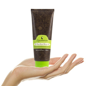 Macadamia Natural Oil jar on bathroom shelf in lifestyle scene conveying salon-quality treatment
