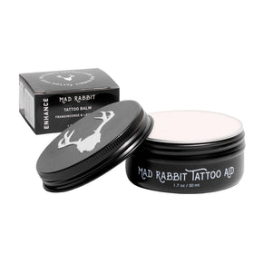 Mad Rabbit front packaging shows jar label and vibrant branding, signaling clean aftercare