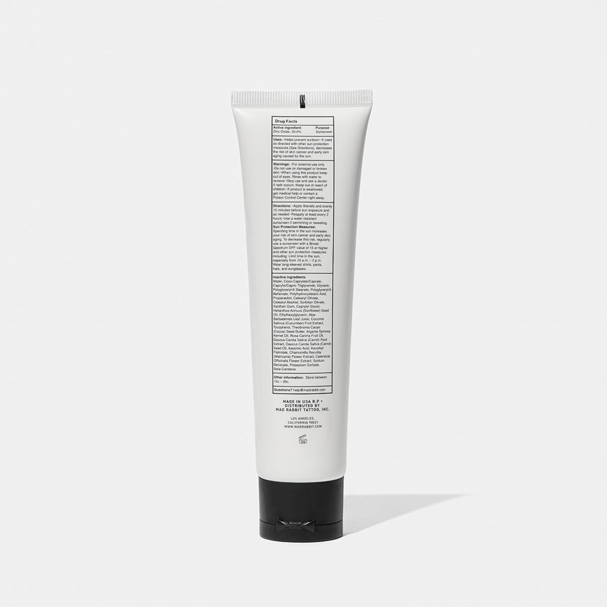 Mad Rabbit sunscreen used outdoors on beach demonstrating durable sun protection