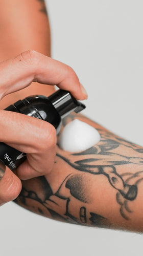 Mad Rabbit bottle staged in bathroom for everyday aftercare routine
