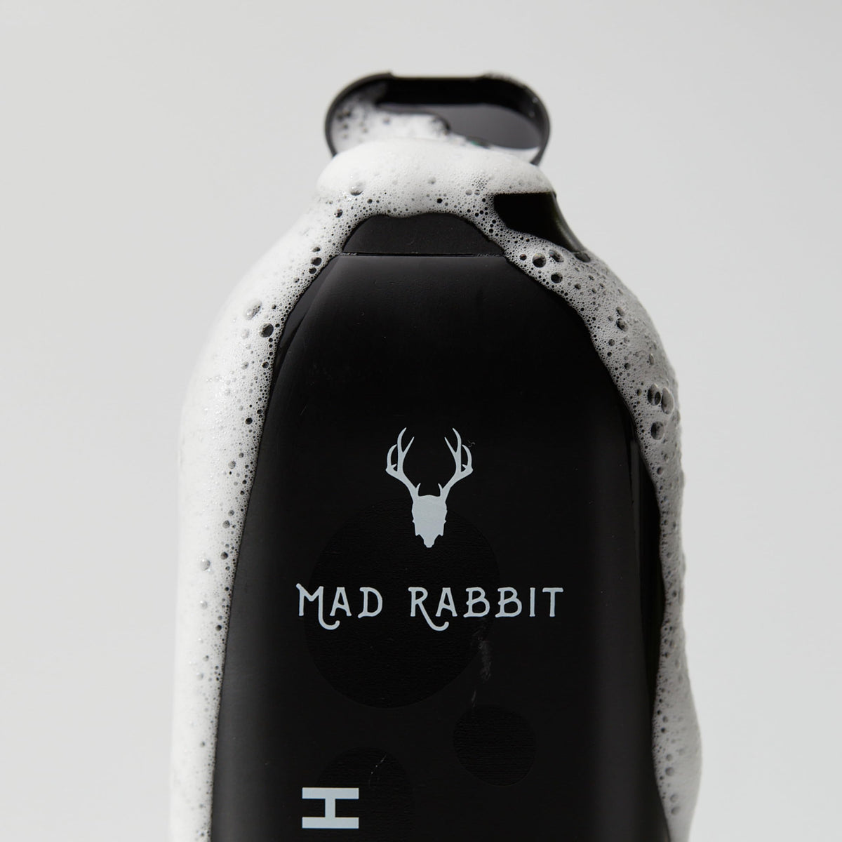 Mad Rabbit with coconut and vanilla props, evokes the clean soothing scent