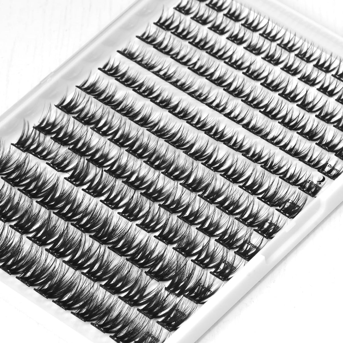 Madam Fifi close-up of individual sticky lash cluster texture and feathered finish