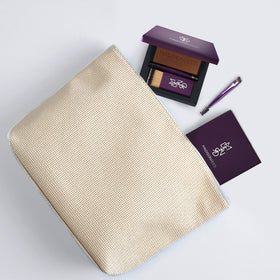 Madison Reed compact in travel lifestyle setting ready for on-the-go root fixes