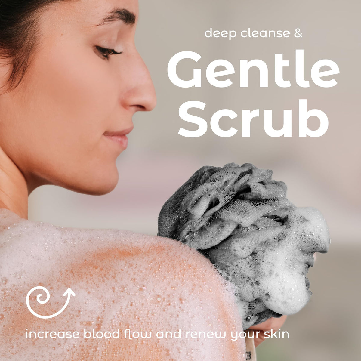 MainBasics loofah held in hand to show compact size and grip