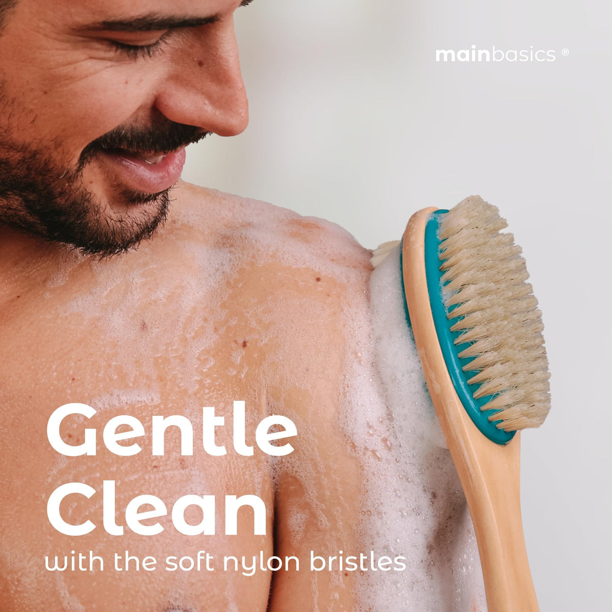 MainBasics brush being used in shower demonstrating full-back coverage