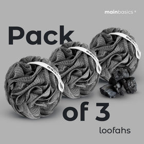 MainBasics loofah on bathroom shelf demonstrating coordinated décor benefit