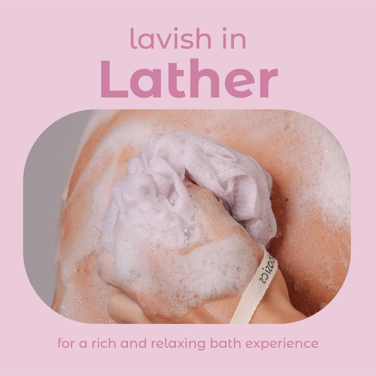MainBasics loofah held in hand showing compact size and ergonomic grip