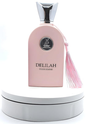 Maison Alhambra Delilah angled bottle with light reflection, highlights premium glass design