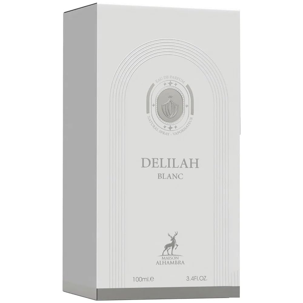 Maison Alhambra Delilah Blanc on vanity with flowers illustrating wearable citrus-floral elegance