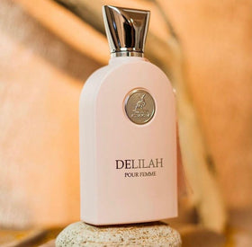 Maison Alhambra Delilah lifestyle woman wearing fragrance, suggests confidence and versatility