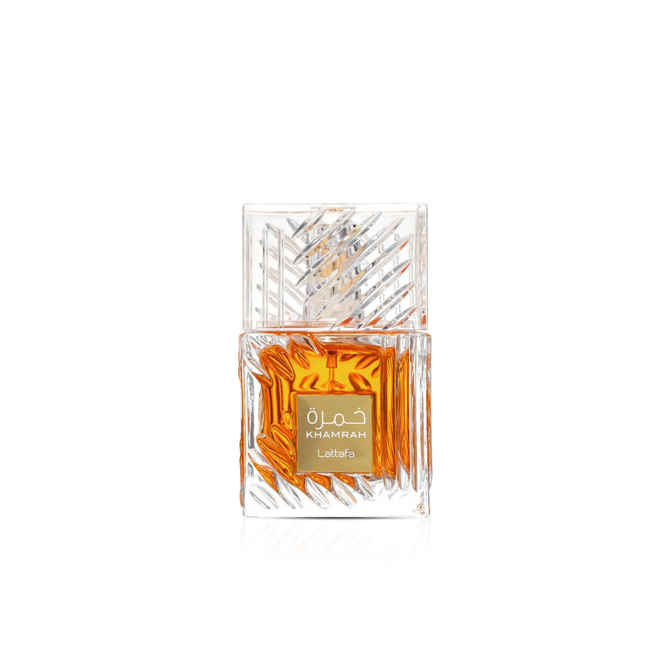 Maison Alhambra front bottle shot showing elegant glass and amber liquid, evokes luxury