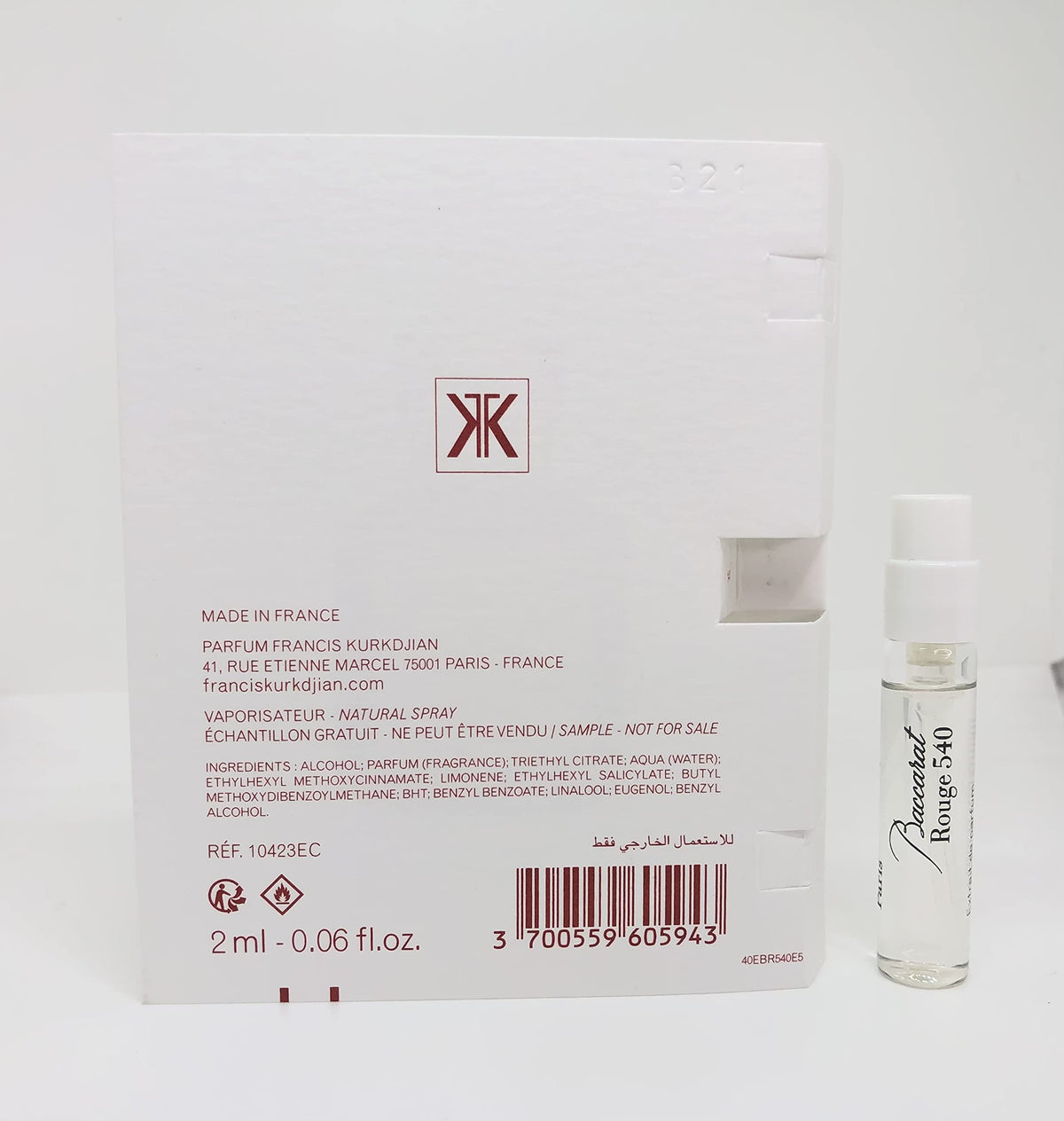 Maison Francis Kurkdjian 2ml vial held in hand for scale, demonstrates travel-sized convenience and potency