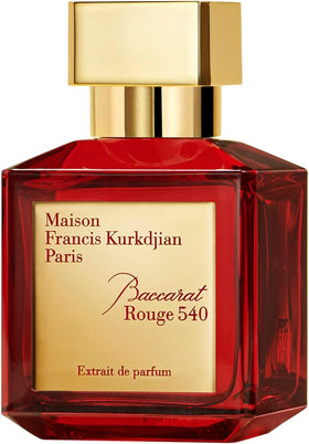 Maison Francis Kurkdjian bottle beside a hand to show 2.3 fl oz size and scale