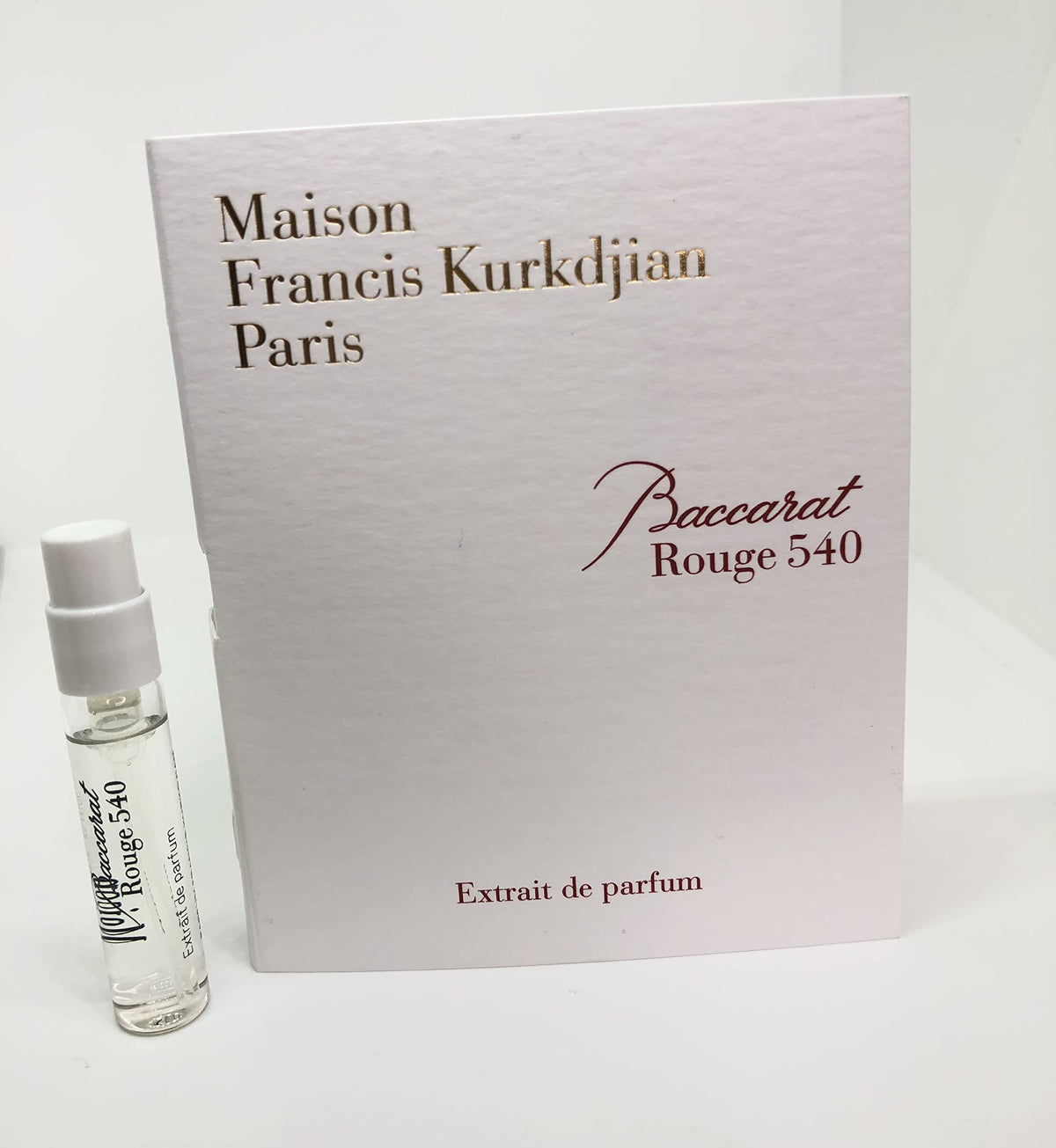 Maison Francis Kurkdjian close-up of vial spray head and liquid, displays fine mist and premium finish