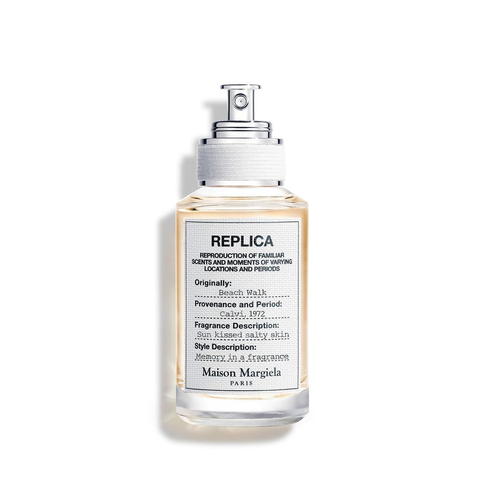 Maison Margiela front bottle view showing compact refillable design and portability
