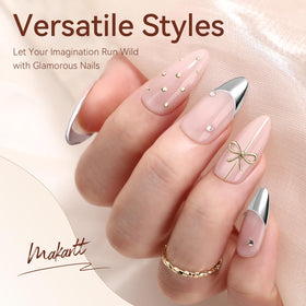 Makartt gold swatch on nail tip highlighting warm metallic mirror shine