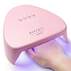 Makartt front view of pink compact lamp showing professional curing surface and portability