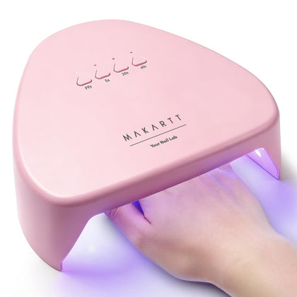 Makartt front view of pink compact lamp showing professional curing surface and portability