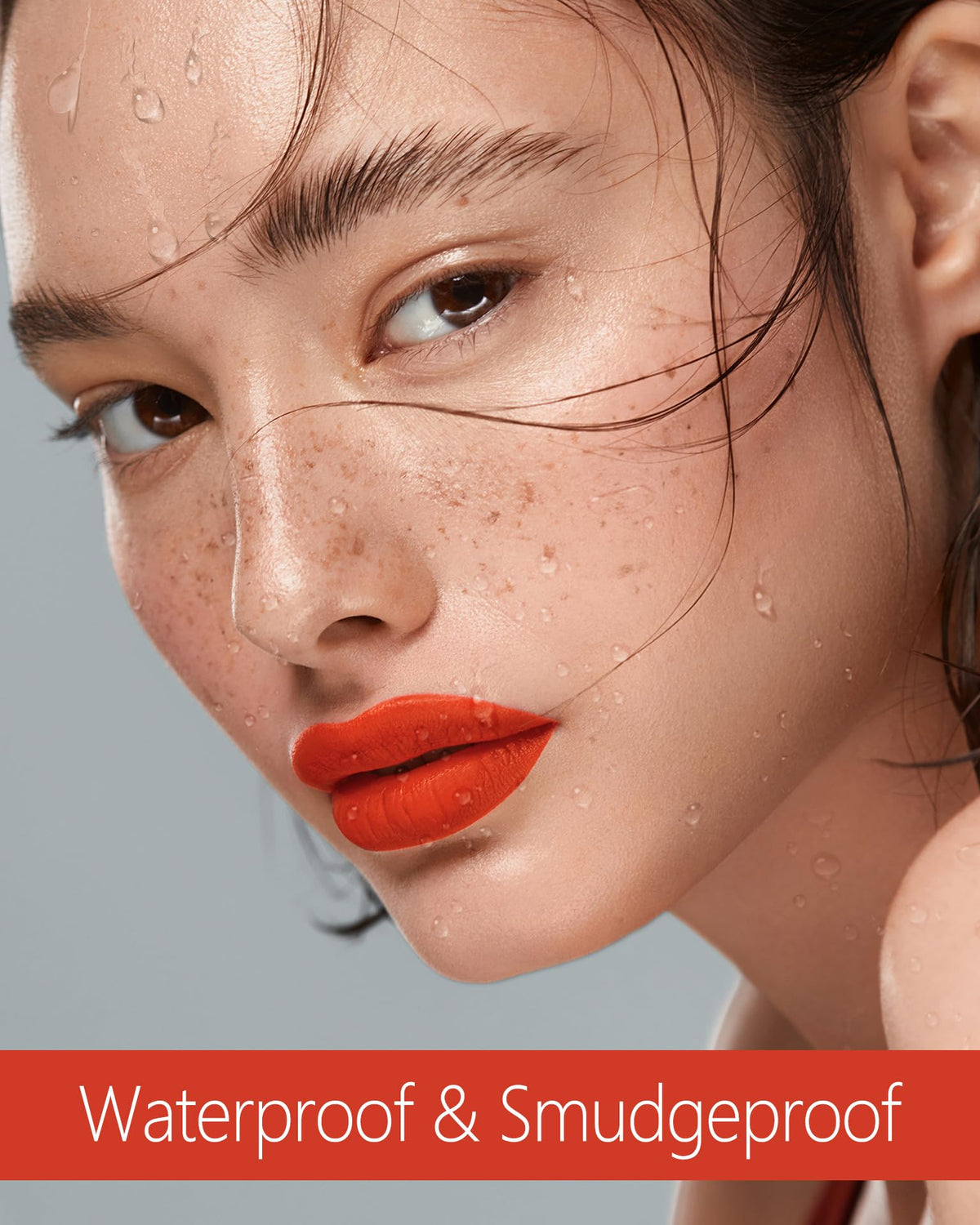 MAKI YIKA on model vibrant orange lip look ideal for photos and events