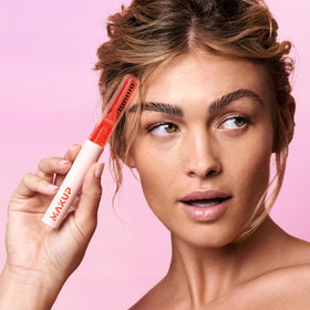 Makup Beauty Brow Me wand with clear gel texture close-up showing precise control