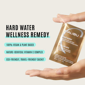 Malibu C being dissolved in wet hands demonstrating easy application and quick activation