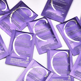 Malibu C close-up of packet label emphasizing vegan vitamin C complex