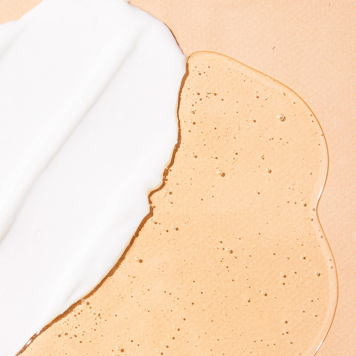 Malibu C conditioner being dispensed showing slip and detangling benefit