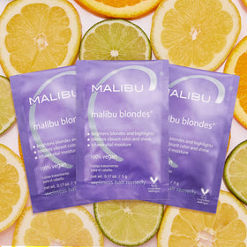 Malibu C open packet with powder texture highlighting concentrated formula