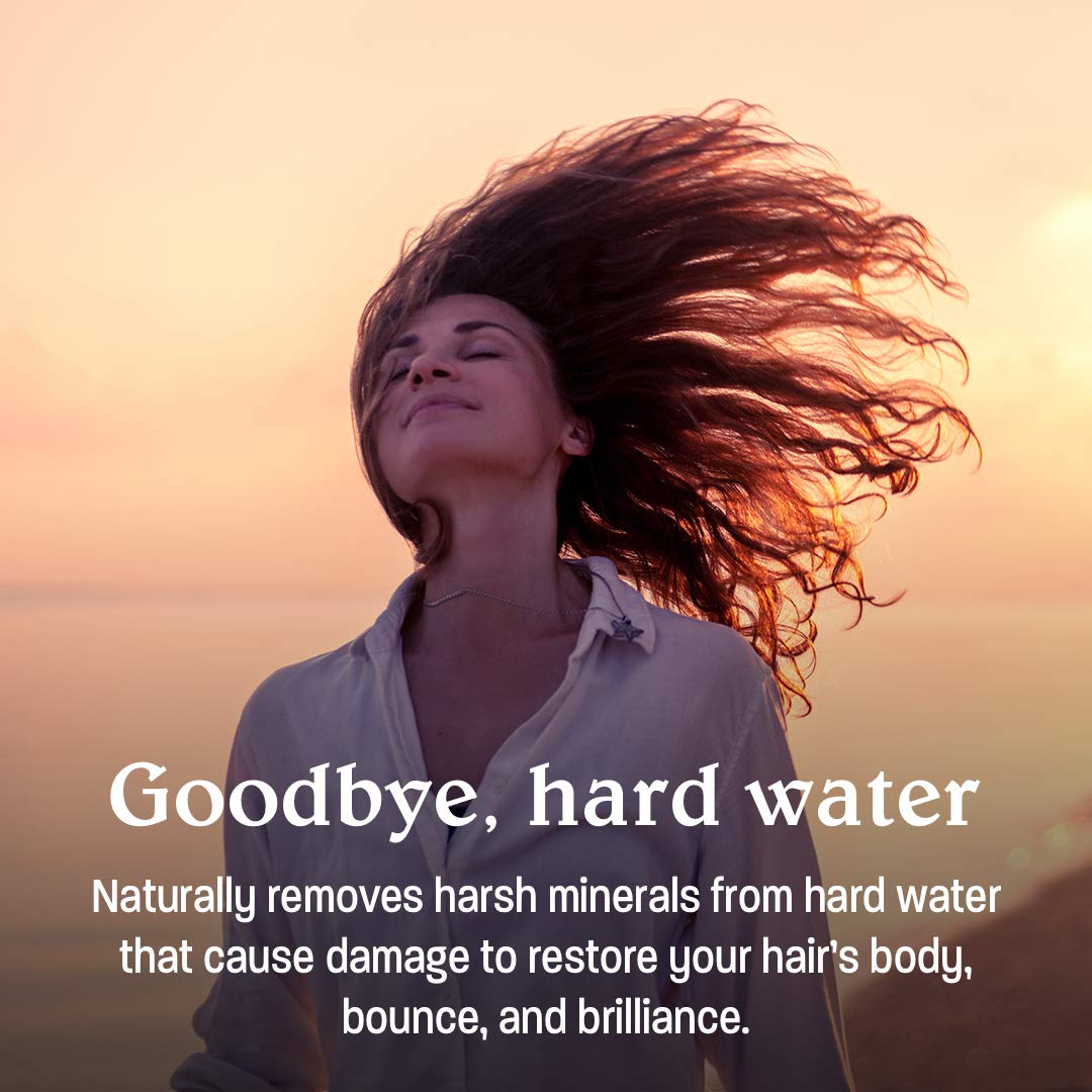 Malibu C shampoo in use on wet hair removing mineral buildup for softer hair